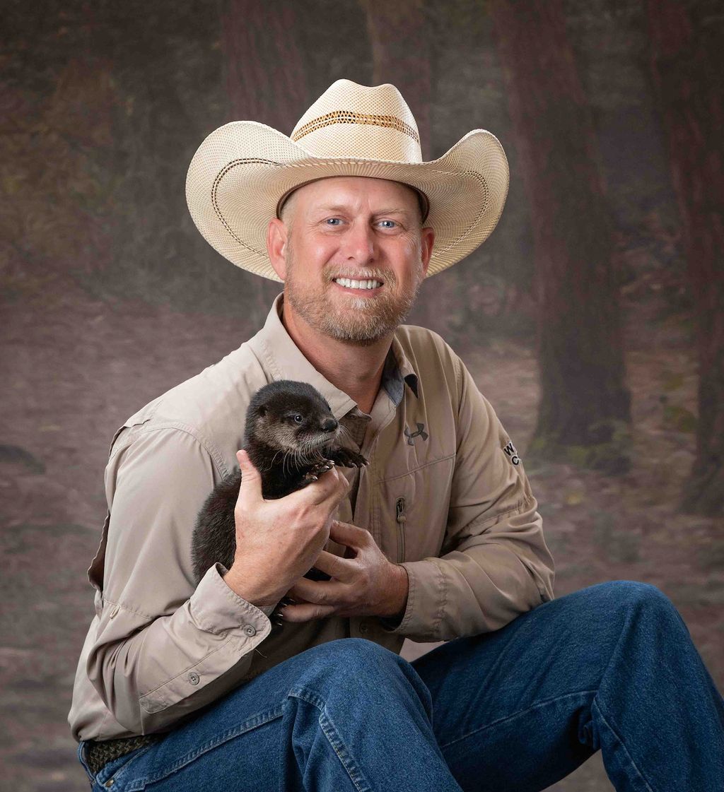 Our owner, Steve, with an orphaned otter