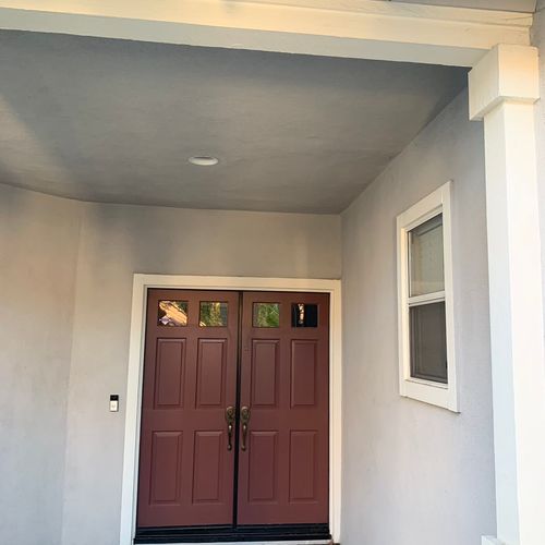 Front door installation, exterior trim, and paint.