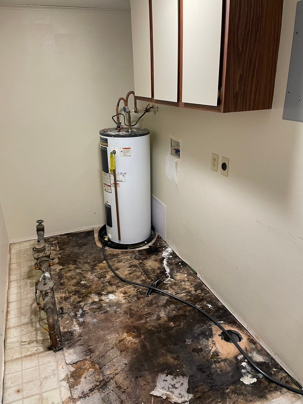 Hot Water tank slow leak caused mold & soft subflo
