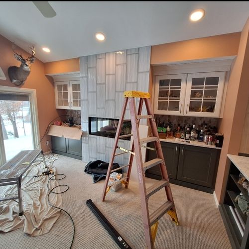 New cabinets,  tiles, fireplace,  paint 