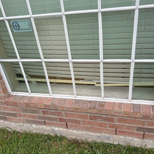 Repaired window from tree damage