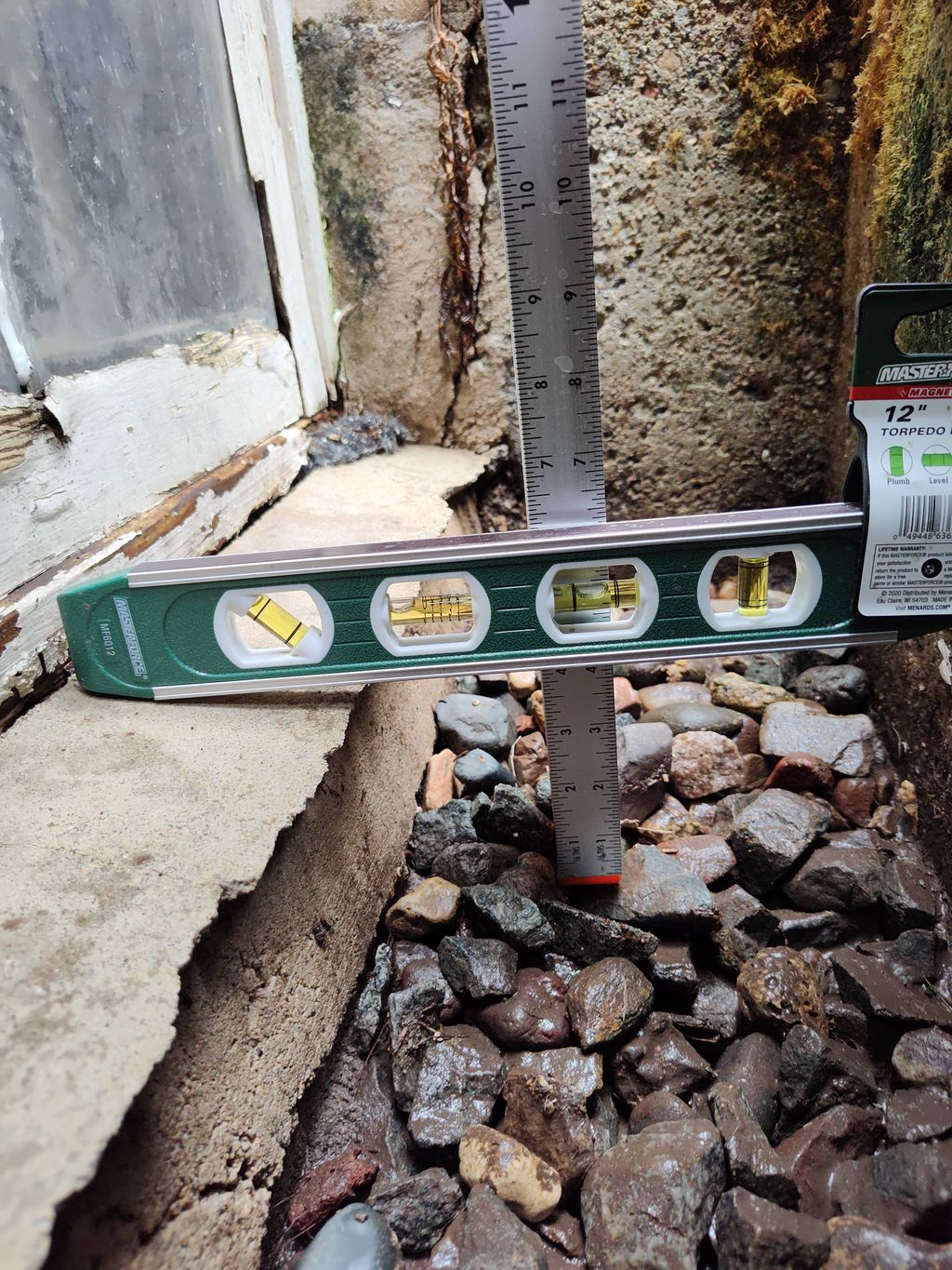 Digged about 4 inches below the sill of an egress 