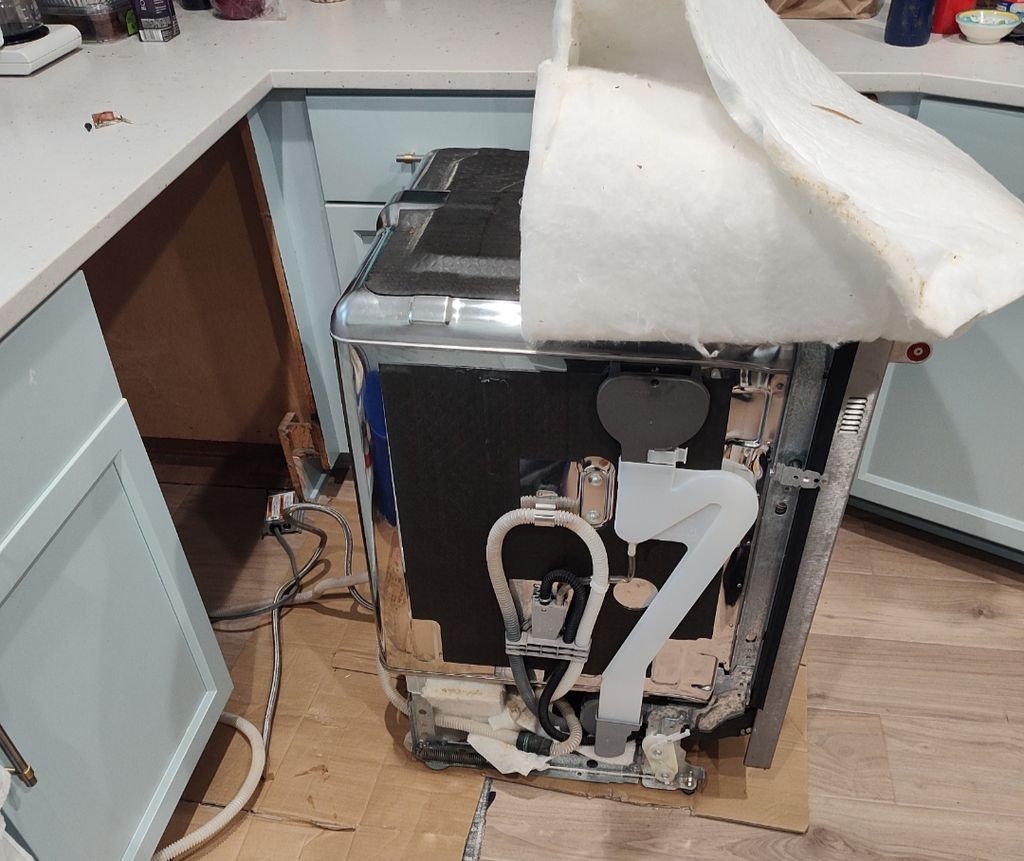 Pulled a dishwasher from its place and ready to re