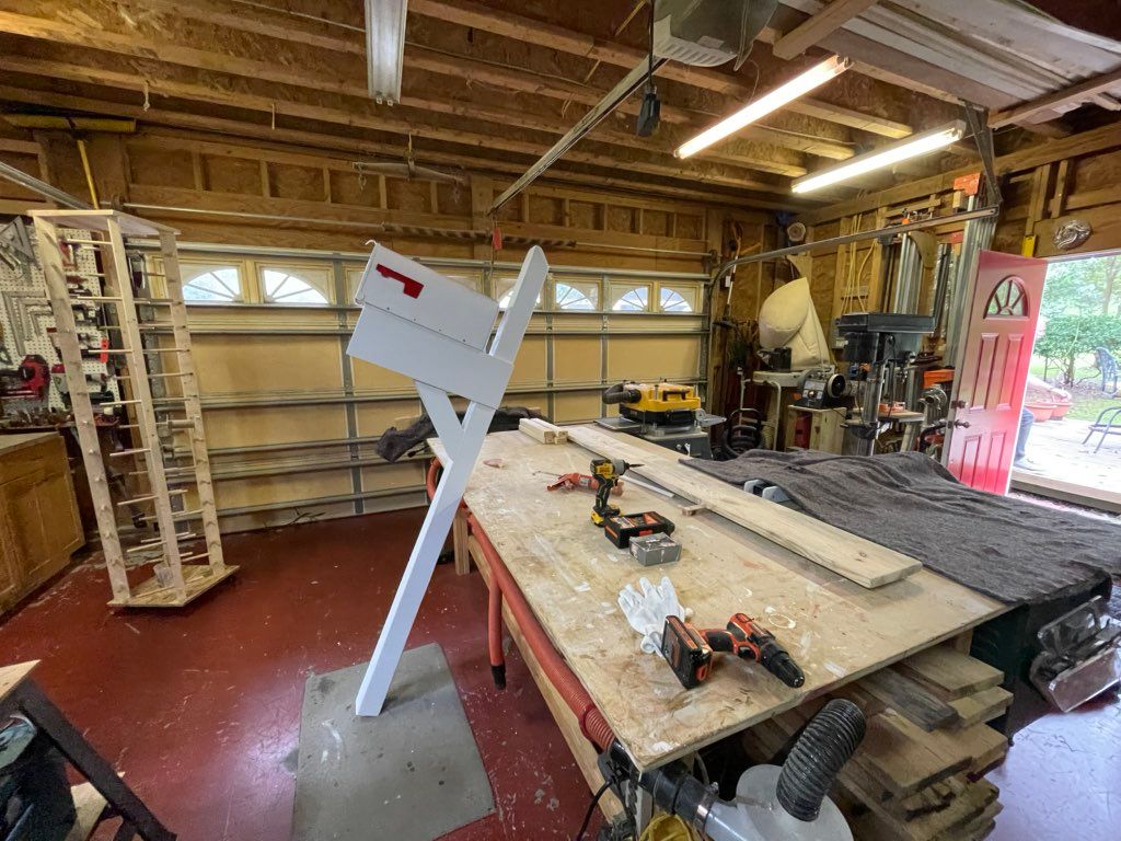 Working on a custom mailbox in the workshop 