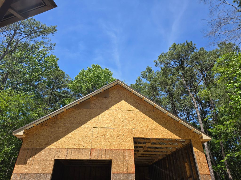 Roof installation and OSB wrap for a workshop 