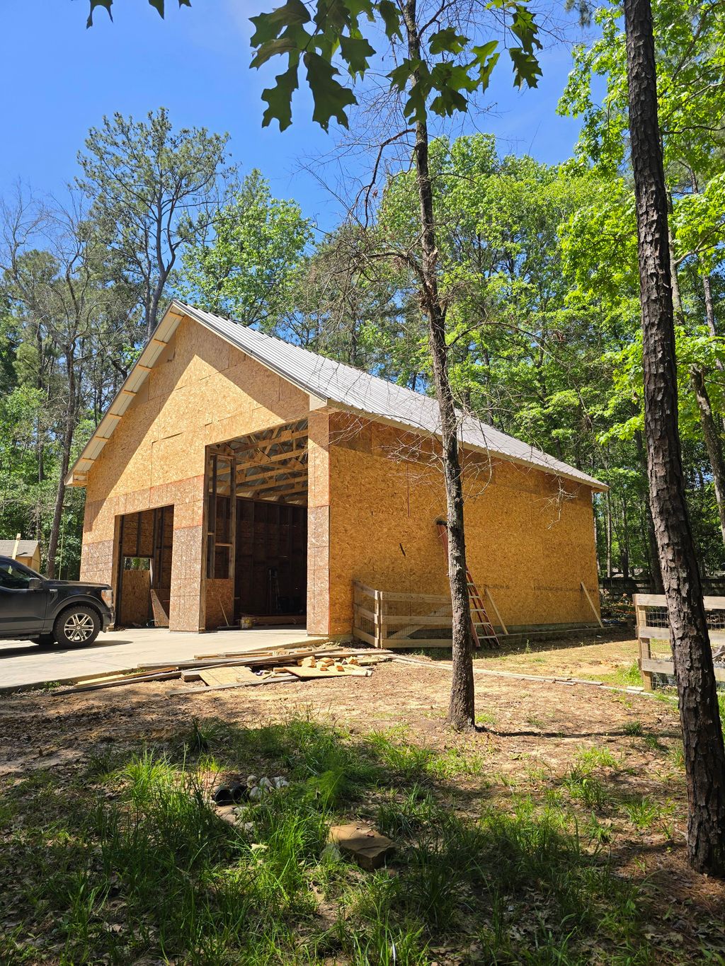 Metal Roof installation and OSB wrap for a worksho