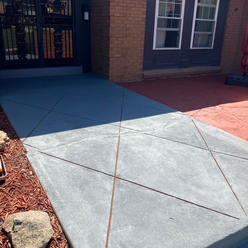 Cleaned and stained front porch concrete 