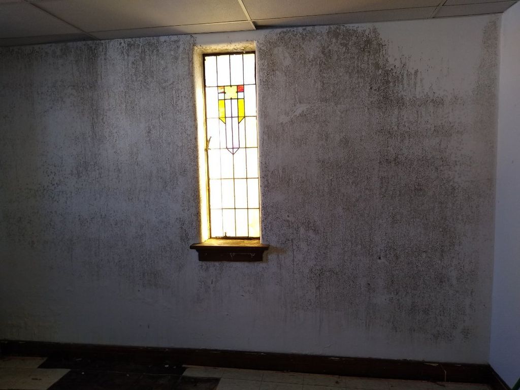 Church wall before remediation