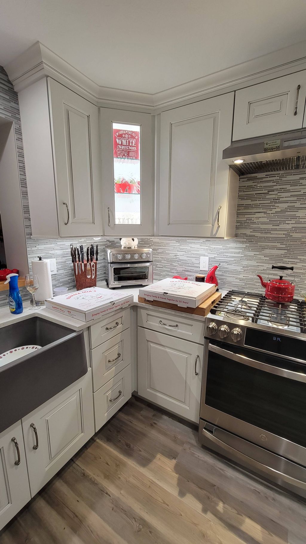 Under cabinet with inside lighting for the glass c