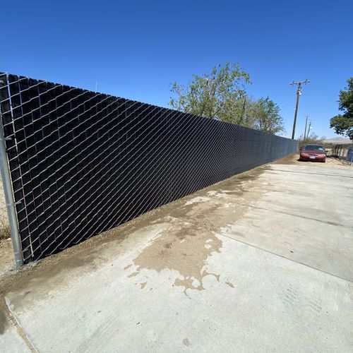 Chain Link Fence with Black Vinyl Privacy Slats