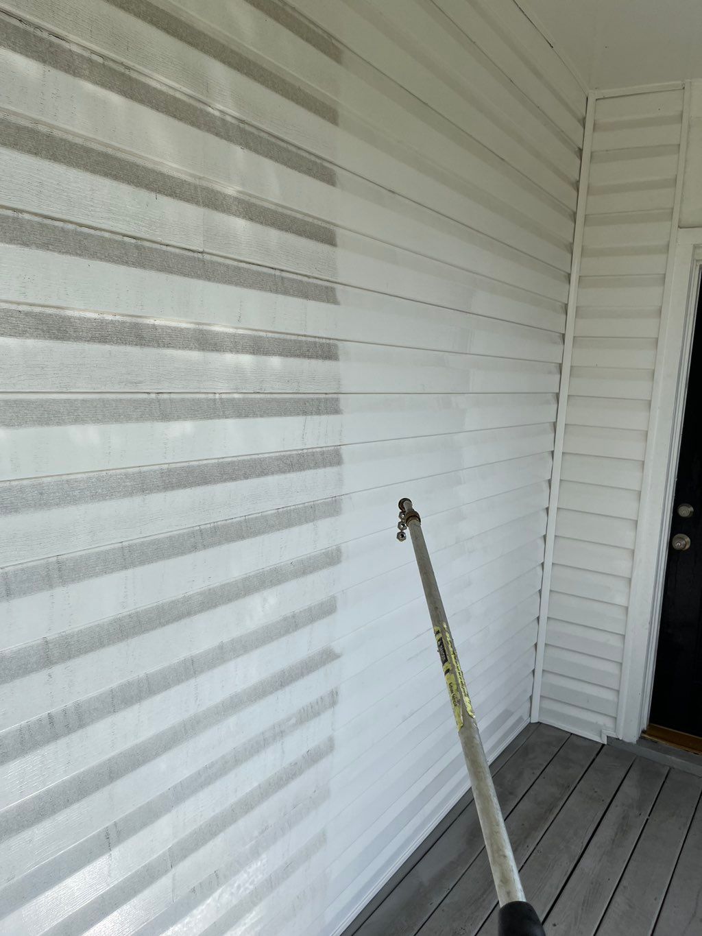 Power washing siding