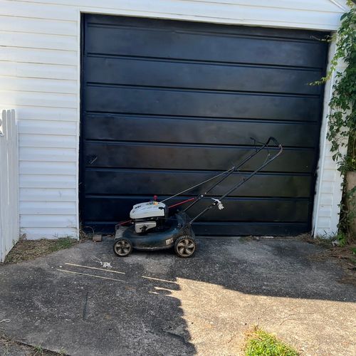 Painted garage door black.