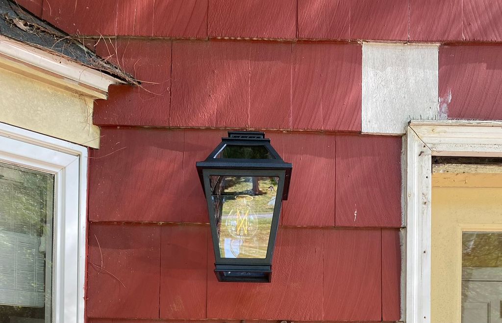 Installed new exterior light fixture for client.