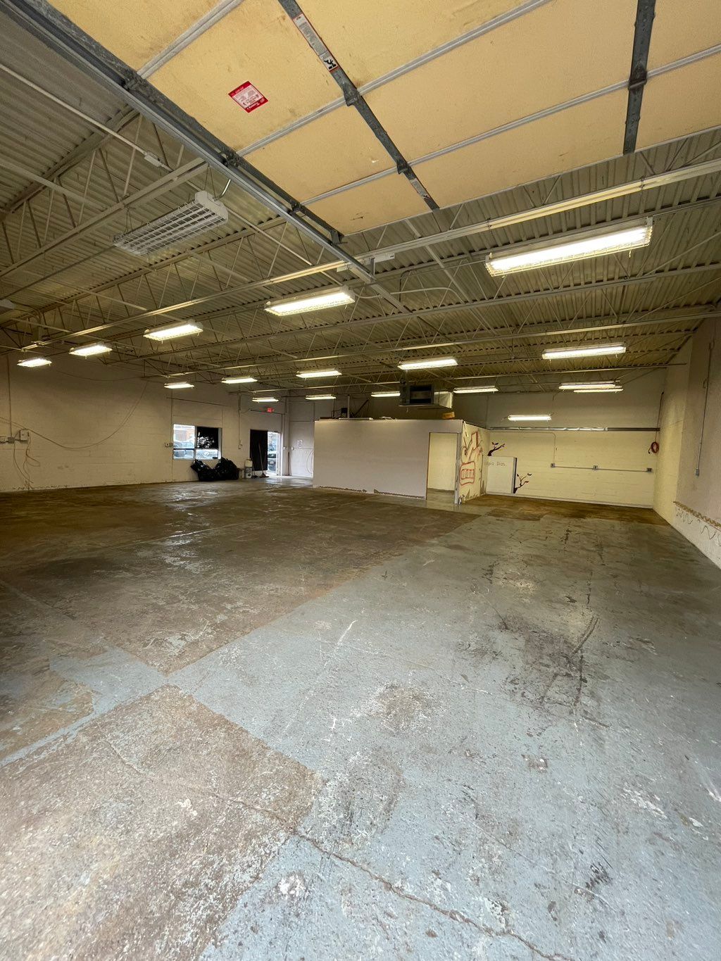 Before, shop makeover. 

Ground floors, primed and