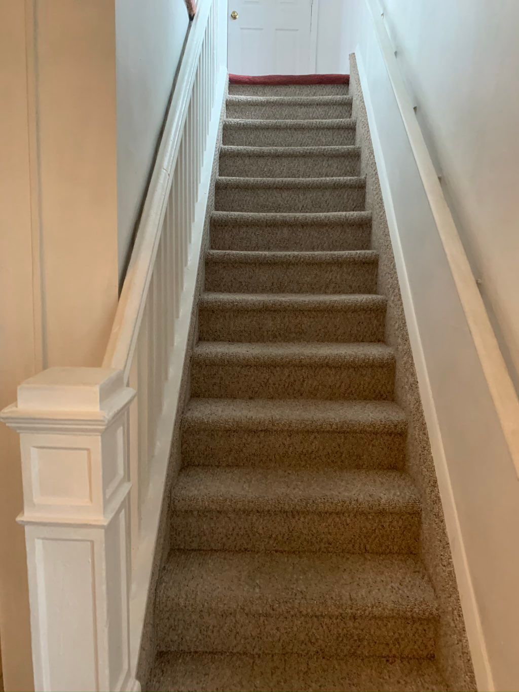 Stairway cleaned and primed with white paint, prep