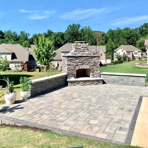 Paver patio sitting walls and fireplace 