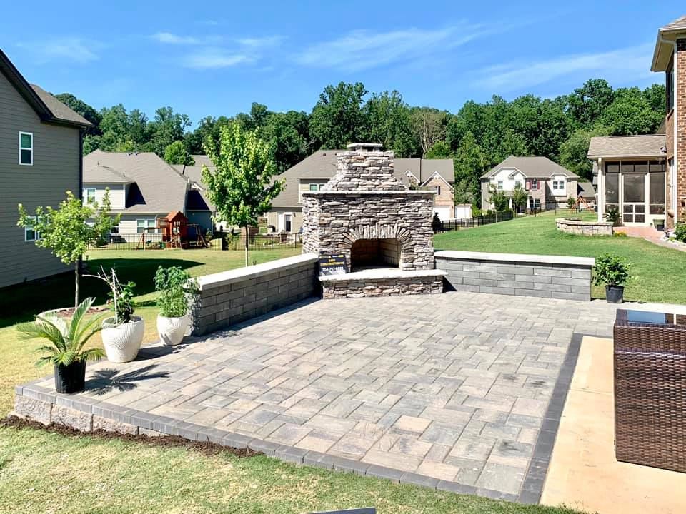 Paver patio sitting walls and fireplace 