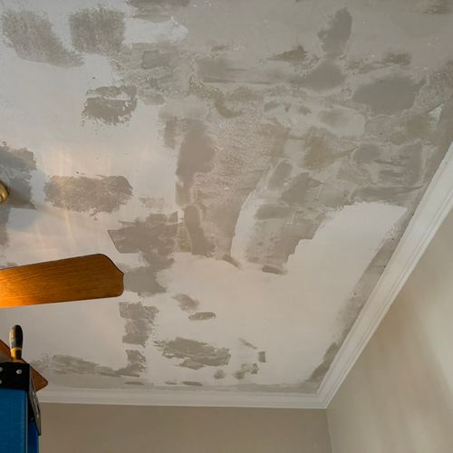 King Construction performing ceiling repair, with 