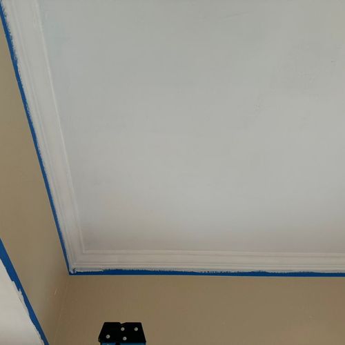 King Construction completing ceiling painting in t