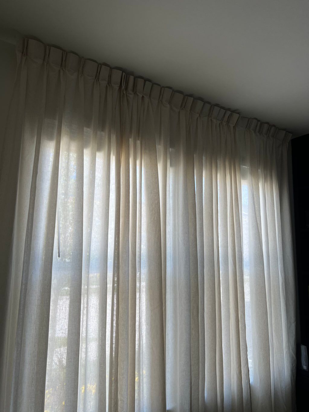 Installed rod for new curtains