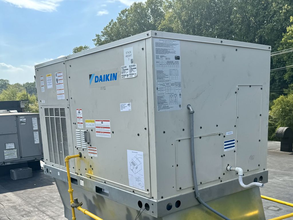 Installation of new Daikin rooftop packaged unit.