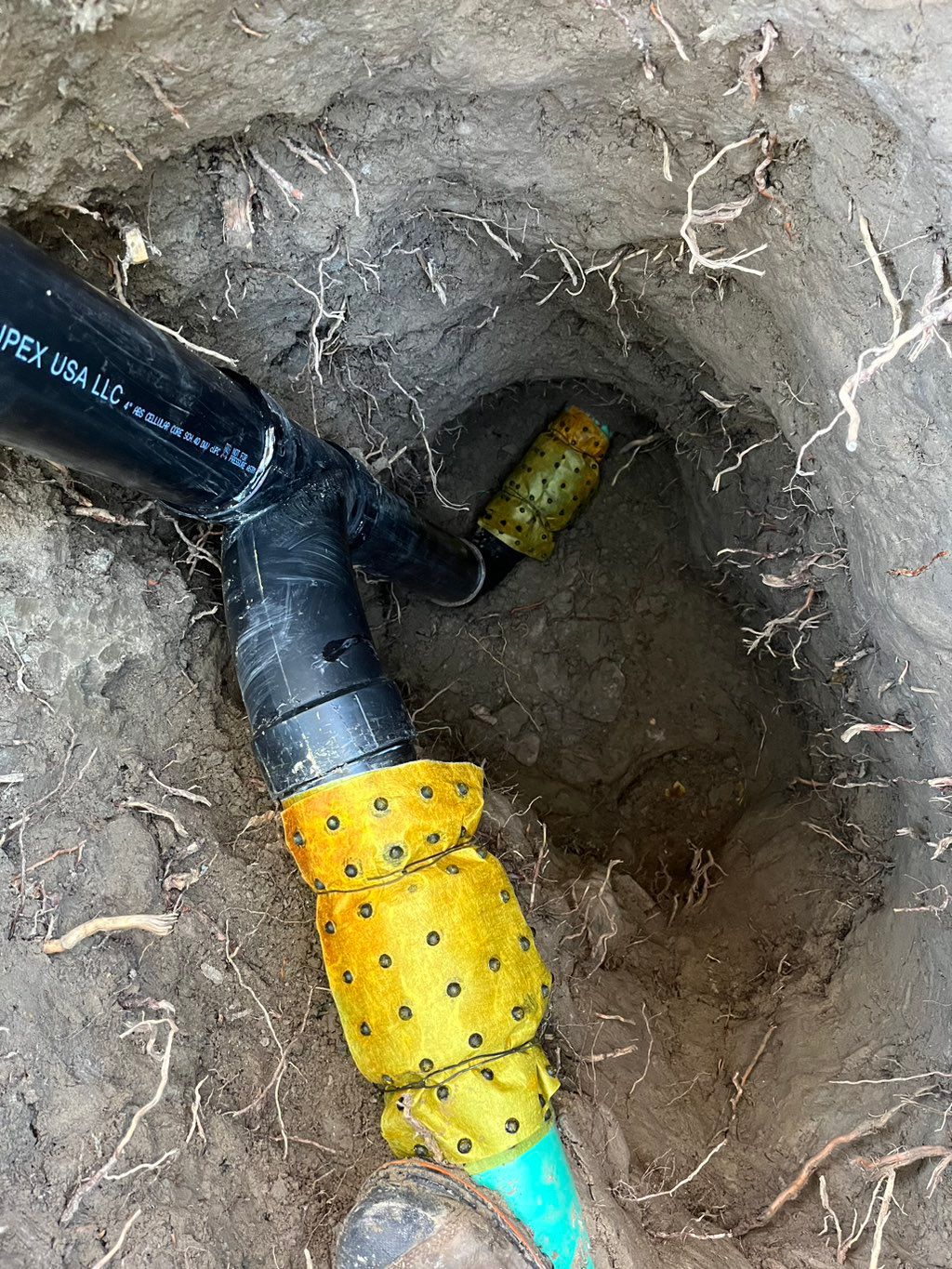 Spot repair on main sewer line at drop