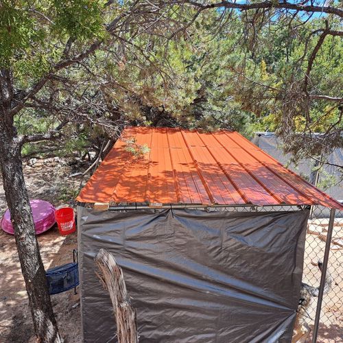 Andrew built a roof for my dog run, and I couldn't