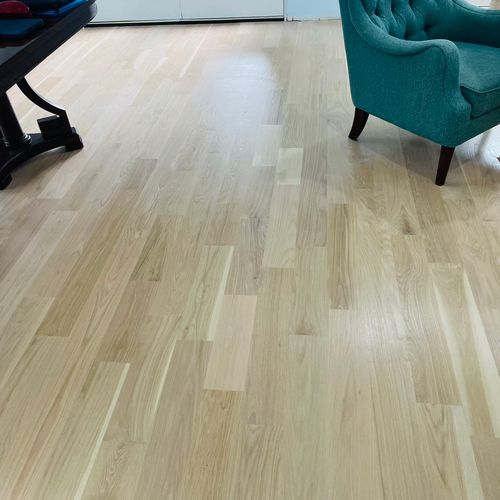 Install new white oak hardwood floors with a Bona 