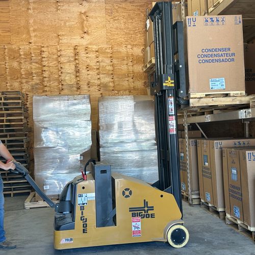 Joey loading up a Carrier condenser for a replacem