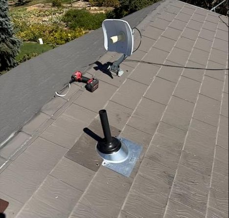 Pipe collar replacement on metal shingle roof