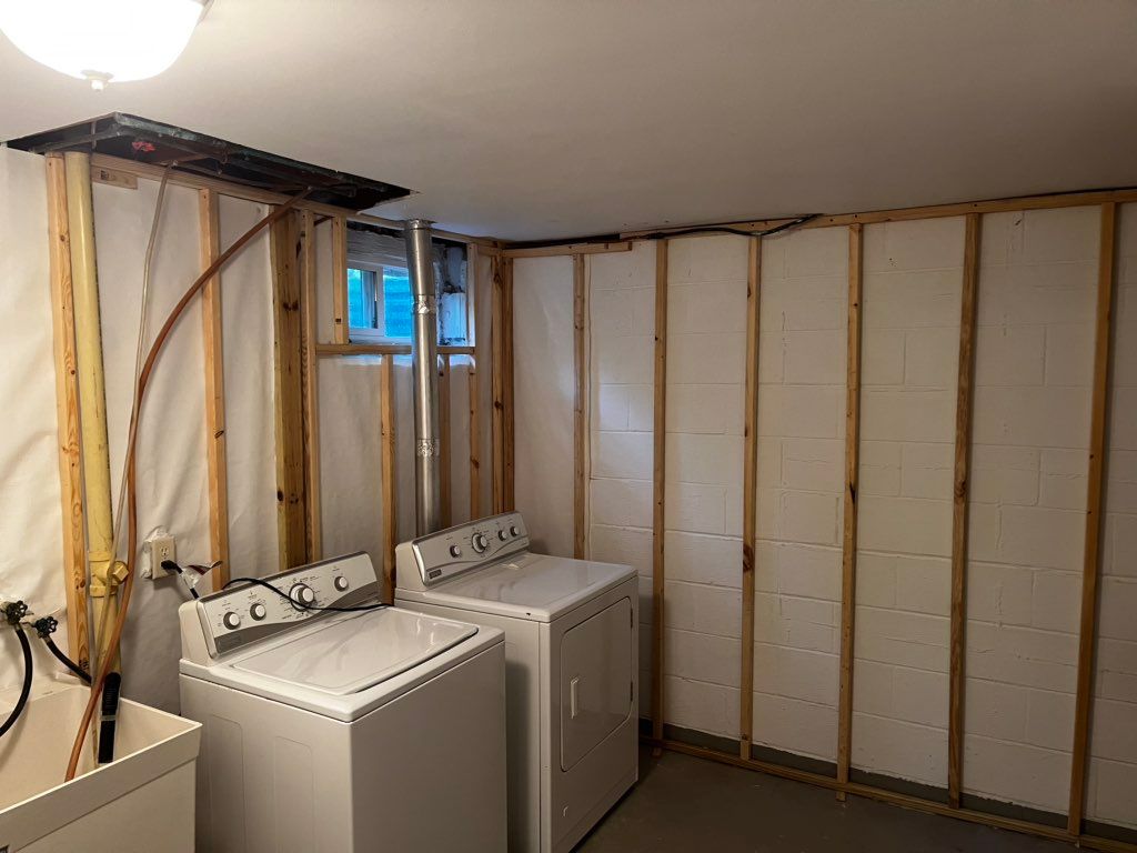 Framed a basement laundry room. 