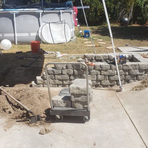 Dan Bessey made a planter for our backyard. We're 