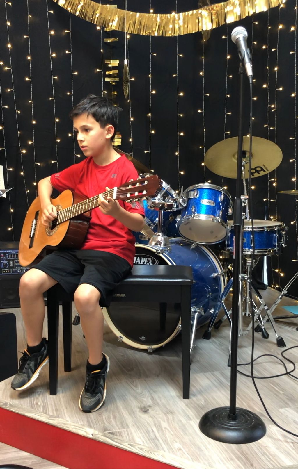 Matt's guitar student performing for the first tim