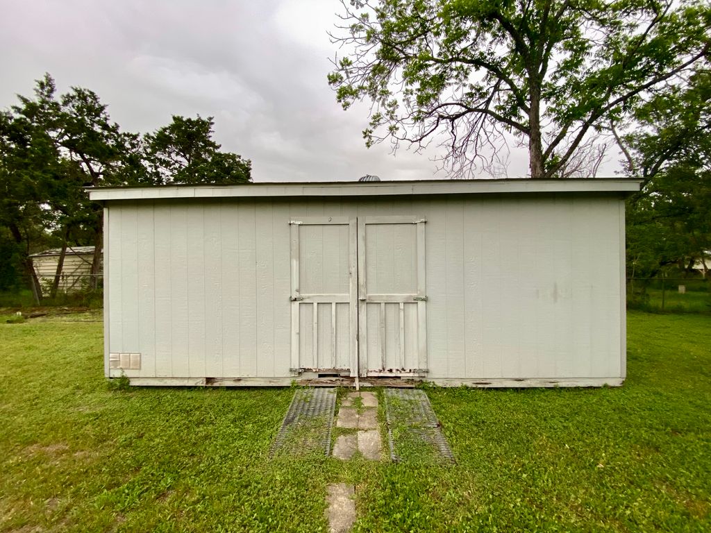 replace 2' of siding at bottom and new caulk/paint