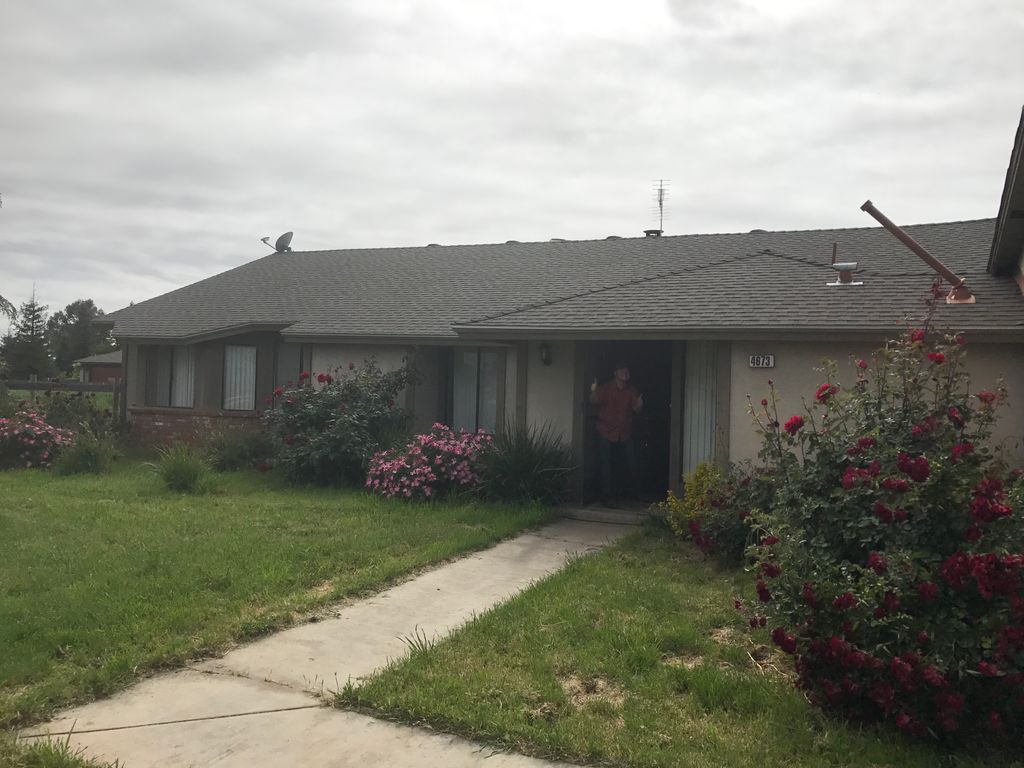 Before windows, doors, re-dash, and landscape