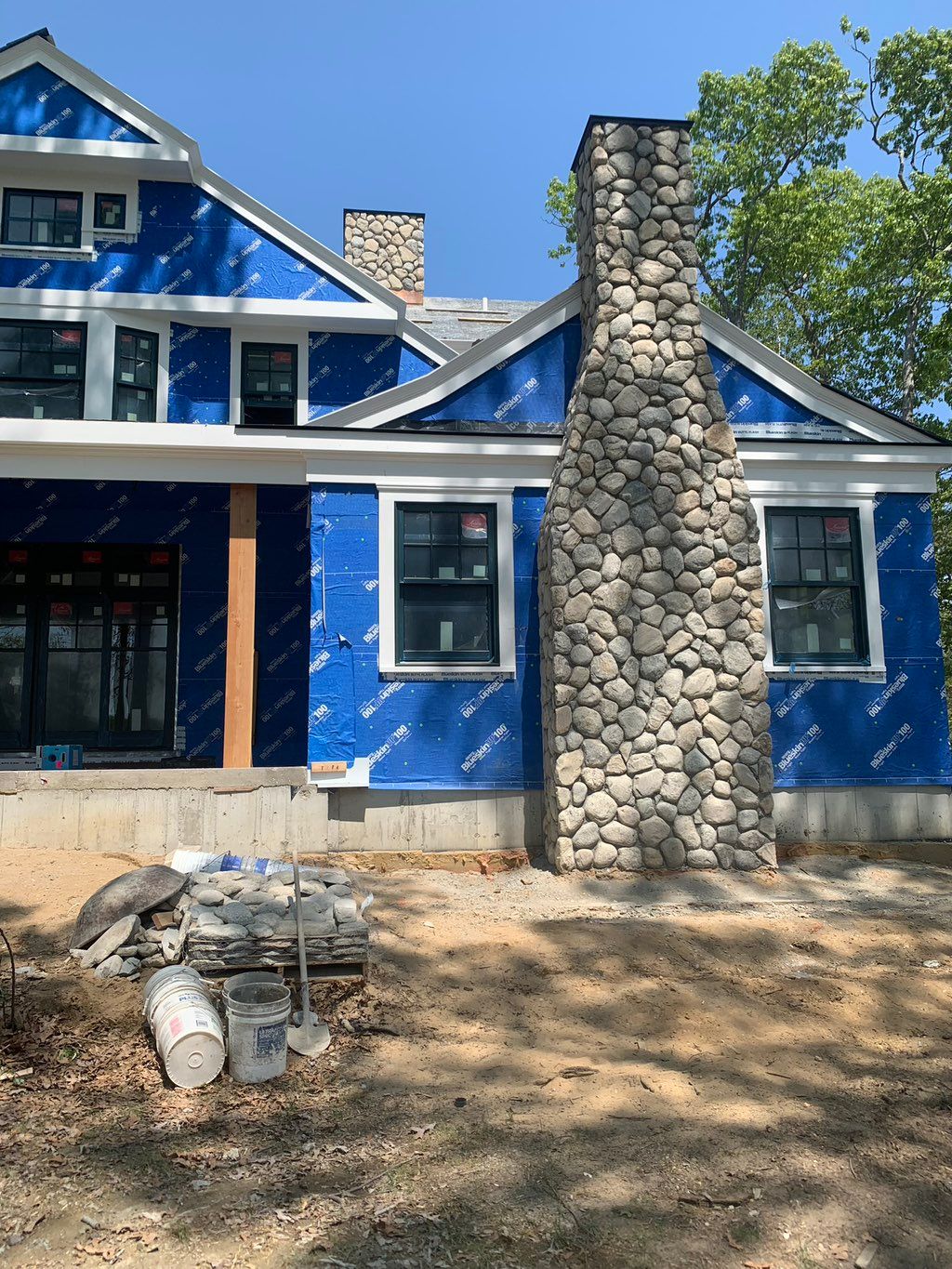 Stone veneer chimney