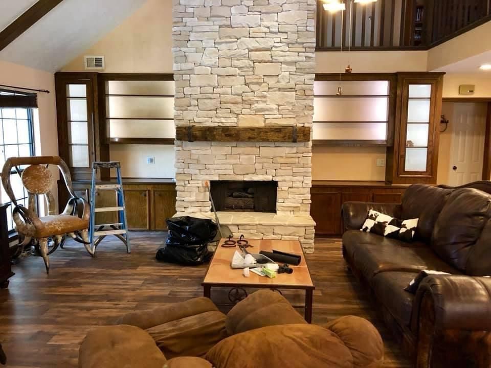 Stone Fire Place and Wood Mantel 