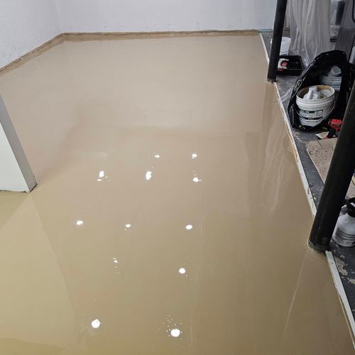 neat epoxy floor. half basement. this is a 3 day p