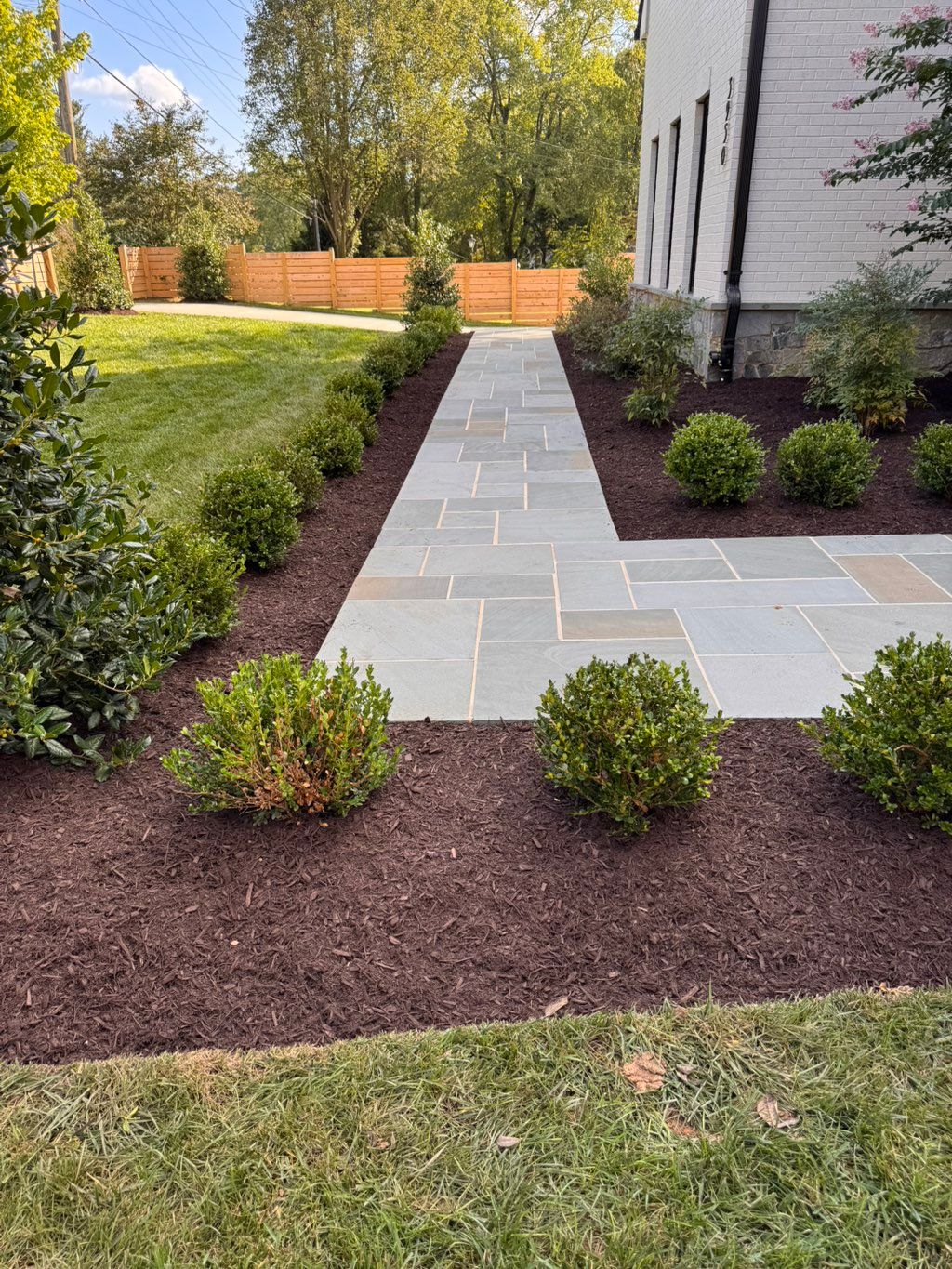 a better style to the beds with brown mulch