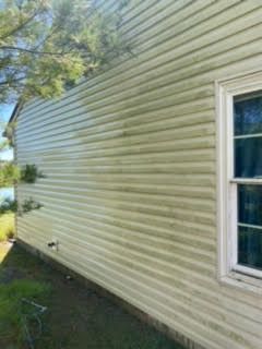 Siding before house wash