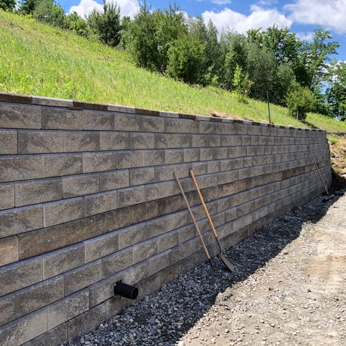 A 100' long retaining wall