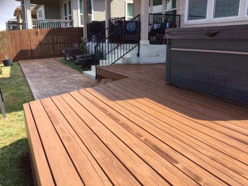 Porch and Fence stain & Stain and Seal walk way.
