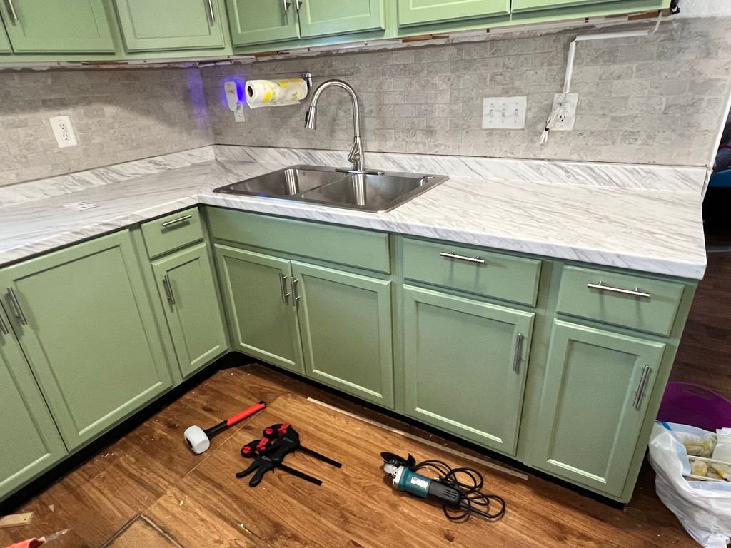 New installed countertop with new sink faucet