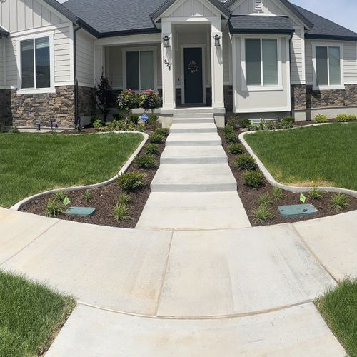 Concrete steps, sod, plants