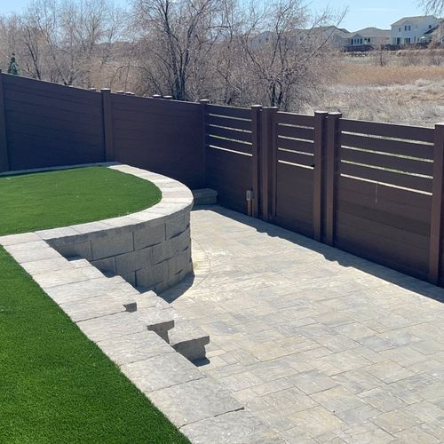 Artificial grass, pavers, stairs, wall