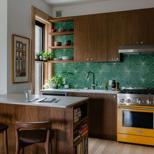 Custom Kitchen Cabinetry and Island: Walnut, Marbl