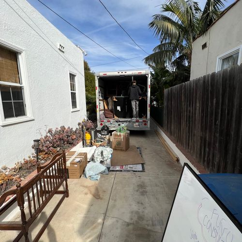 Unloading of truck for move in, and placing items 