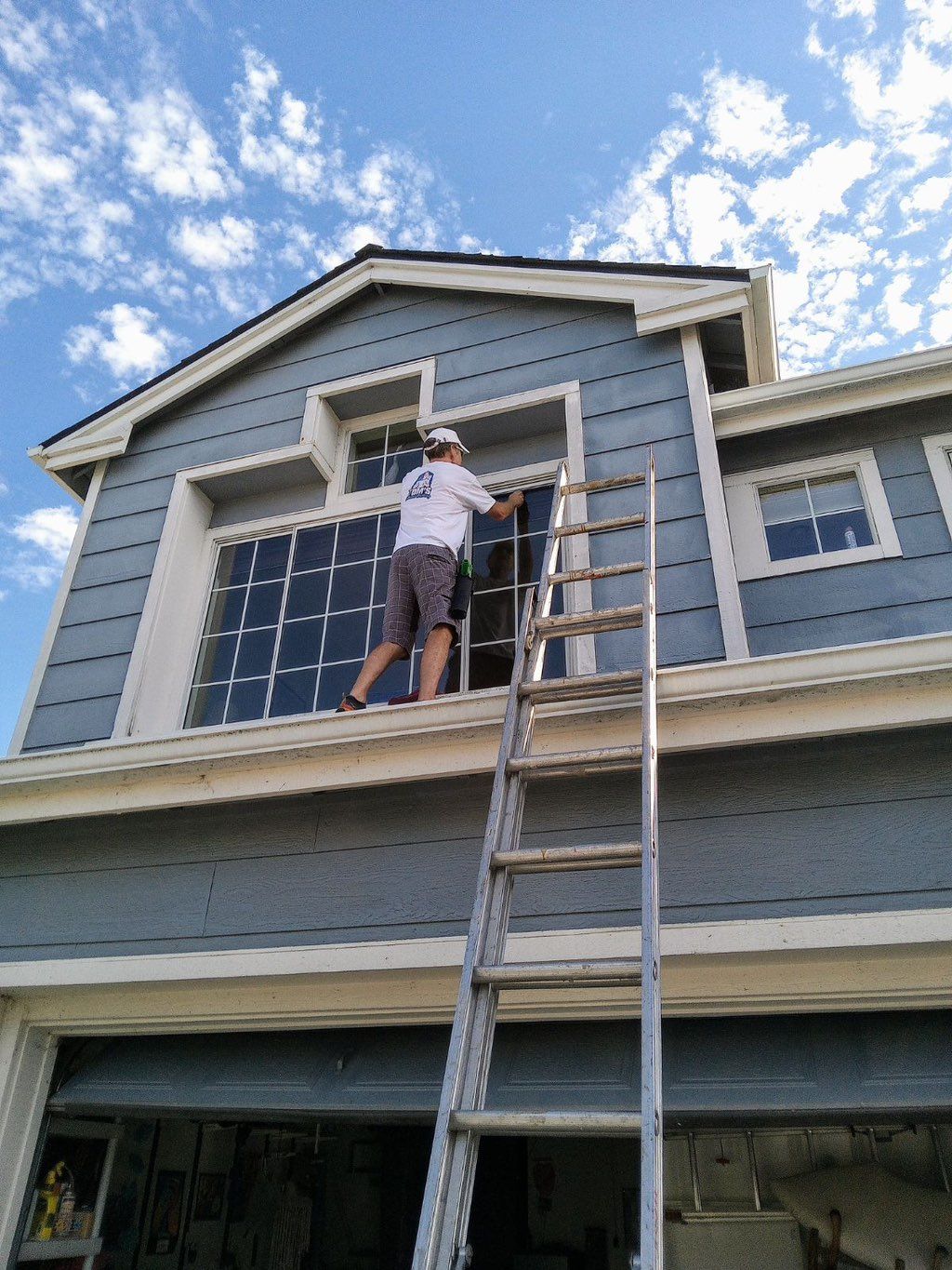 Spotlessly cleaning 2nd floor windows in Richmond!