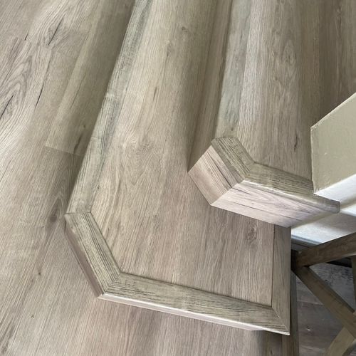 Vinyl flooring in stallion and custom stairs 