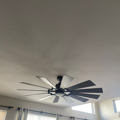 Ran electrical line and installed a ceiling fan 